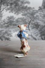 Laden Sie das Bild in den Galerie-Viewer, Spun Cotton Christmas Ornament Sitting Dog with Blue Ribbon