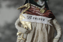 Laden Sie das Bild in den Galerie-Viewer, Spun Cotton Ornament Songbird Girl "Alsace" with Stork