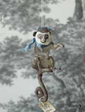 Laden Sie das Bild in den Galerie-Viewer, Sitting Monkey with Blue Ribbon Spun Cotton Figurine