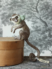 Laden Sie das Bild in den Galerie-Viewer, Sitting Monkey with Green Ribbon Spun Cotton Figurine