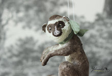 Laden Sie das Bild in den Galerie-Viewer, Sitting Monkey with Green Ribbon Spun Cotton Figurine