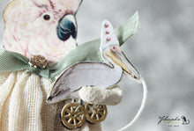 Laden Sie das Bild in den Galerie-Viewer, Spun Cotton Ornament Cockatoo Girl with Pelican Pull Toy