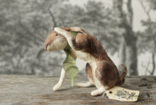 Laden Sie das Bild in den Galerie-Viewer, Spun Cotton Standing Figurine Sitting Hare Paw