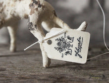 Laden Sie das Bild in den Galerie-Viewer, Spun Cotton Ornament Dog with Green Ribbon