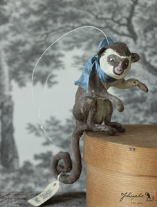 Sitting Monkey with Blue Ribbon Spun Cotton Figurine