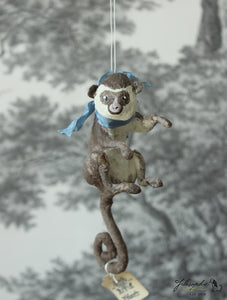 Sitting Monkey with Blue Ribbon Spun Cotton Figurine